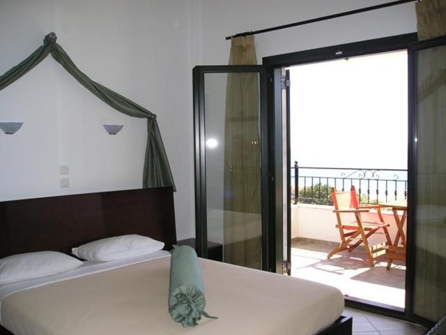 Golden Beach Inn Khrysi Ammoudia Rom bilde