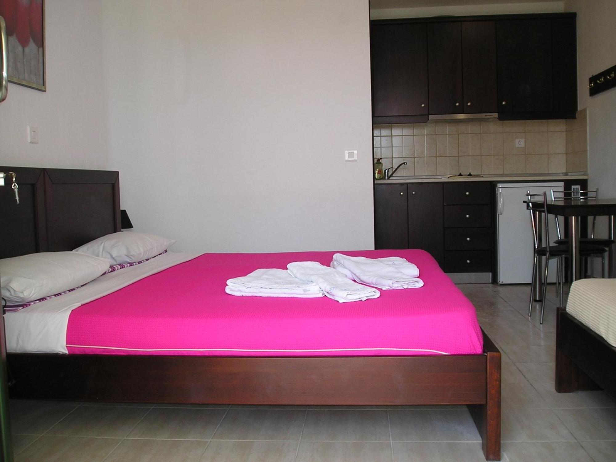 Golden Beach Inn Khrysi Ammoudia Rom bilde