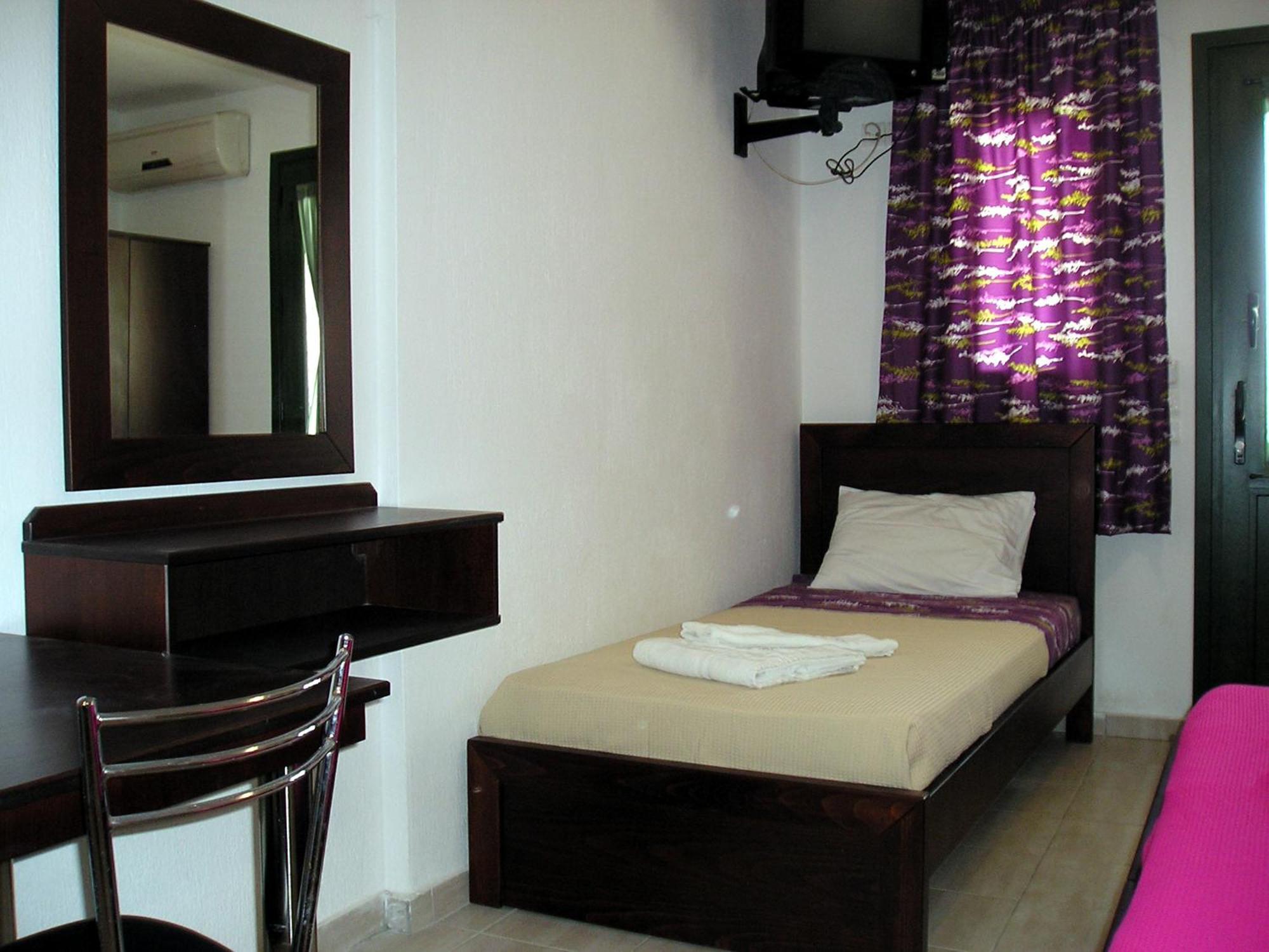 Golden Beach Inn Khrysi Ammoudia Rom bilde