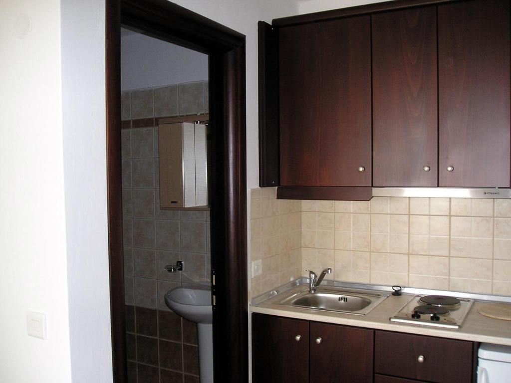 Golden Beach Inn Khrysi Ammoudia Rom bilde